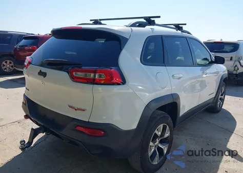 2014 Jeep Cherokee Trailhawk from USA, damaged, VIN 1C4PJMBSXEW212295